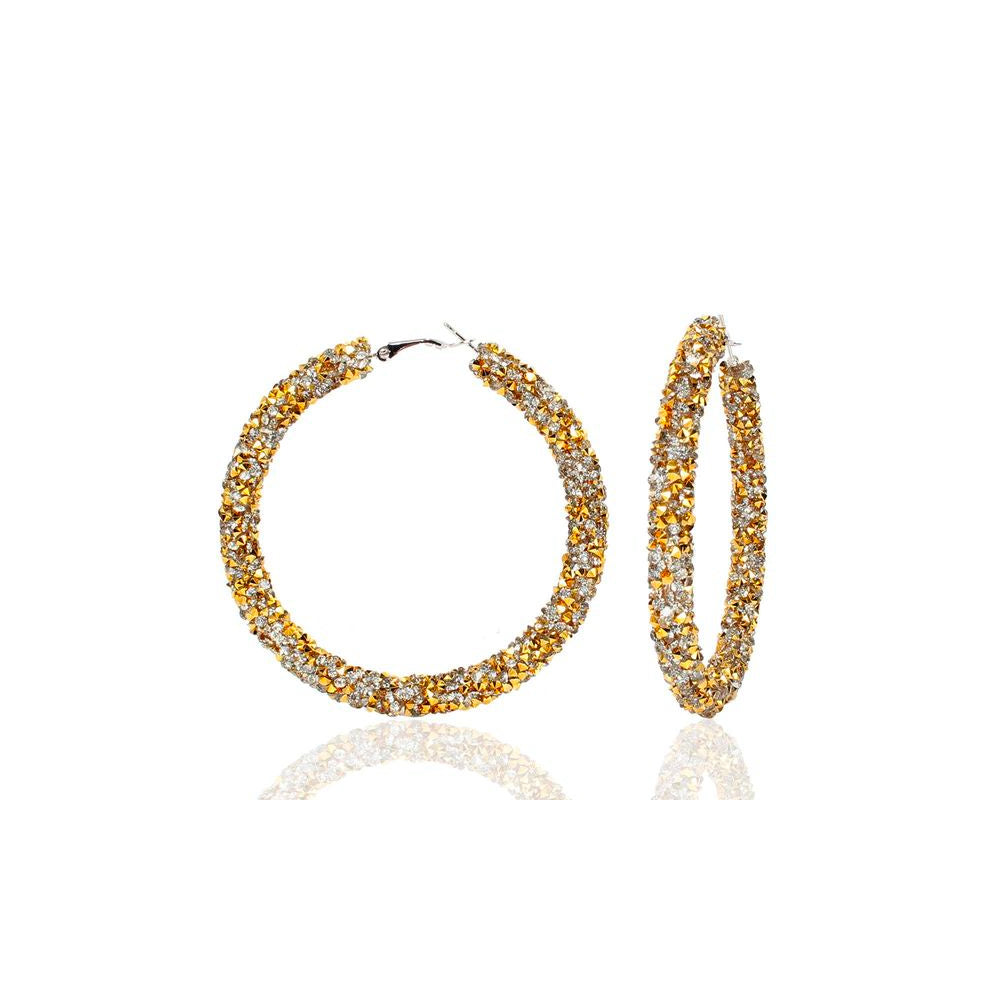 BESKRIVNING När och vart är partyt? Kalla in alla Bachelorettes med Öronringar för extravagans och fest. MÅTT  6,5 cm ø  MATERIAL Silver på zink med glitter av strass (nickelfri)     För maximal hållbarhet, se vår guide BLING OF BENELUX® - SIMPLY HER STYLE